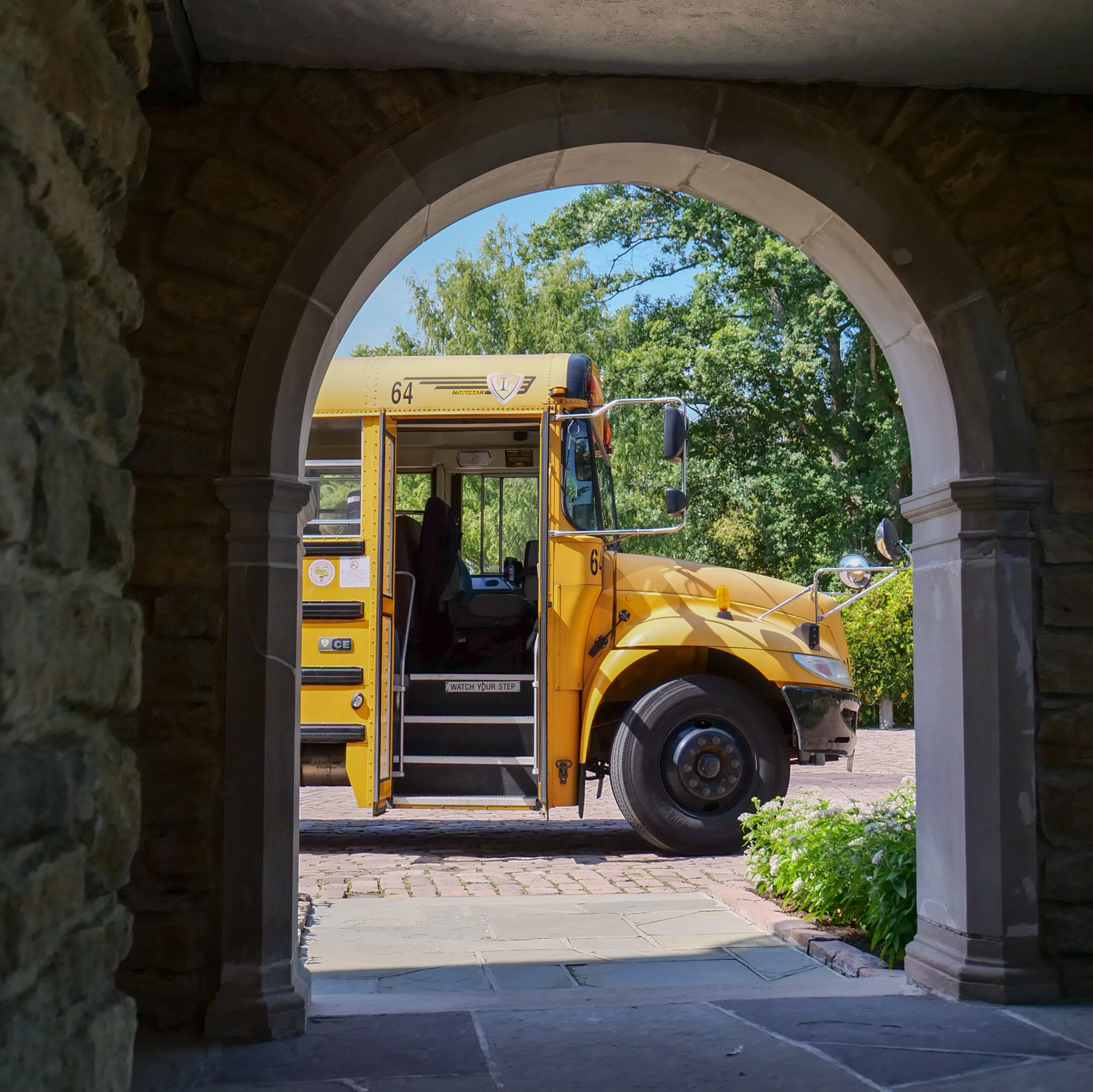 yellow school bus in archway