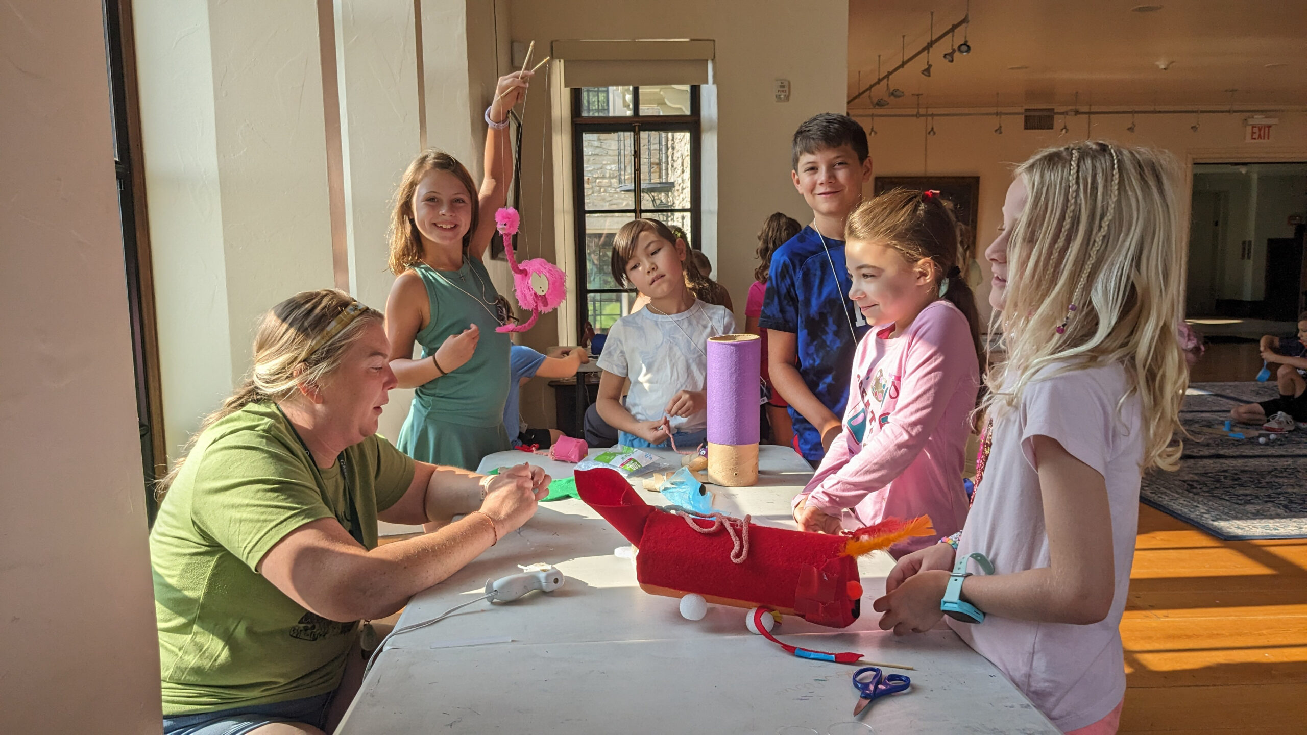 Campers creating props for their theatrical performance